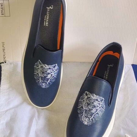 Mocassins en cuir avec tête de lion