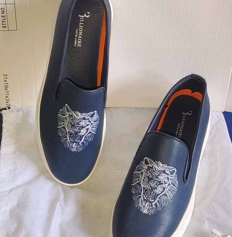 Mocassins en cuir avec tête de lion